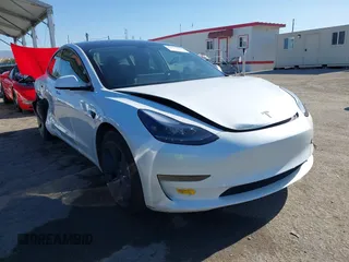 2023 Tesla Model 3 with VIN 5YJ3E1EA2PF410378, listed as a IAAI auction lot 42265294 with 16,000 mi miles and . Bid and sale history available at DreamBid. Image 1.