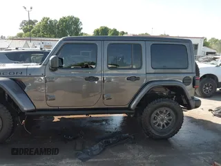 2022 Jeep Wrangler Unlimited Rubicon 392 с VIN 1C4JJXSJ6NW193565, выставлен на аукционе IAAI как лот 42050331 с пробегом 21 382 миль миль и . История ставок и продаж доступна на DreamBid. Изображение 14.