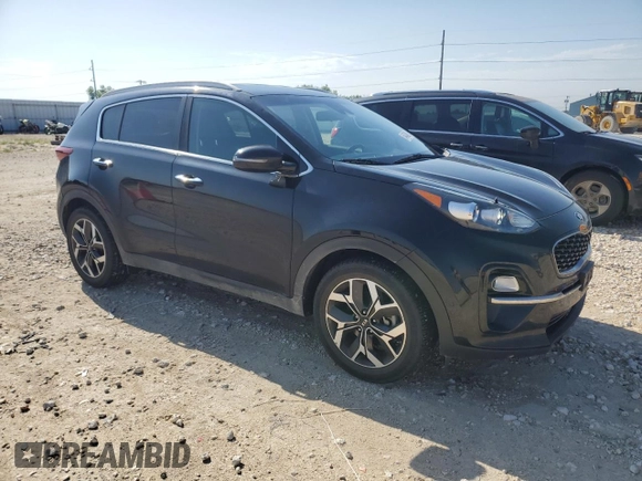 2020 Kia Sportage EX z VIN KNDPN3AC3L7702030, wystawiony jako Copart lot #54978895 z przebiegiem 53 099 mil mil oraz Czysty tytuł • Clean title. Historia ofert i sprzedaży dostępna na DreamBid. Obrazek 4.