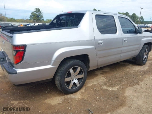 2014 Honda Ridgeline SE with VIN 5FPYK1F62EB013329, listed as a IAAI auction lot 41876728 with 127,014 mi miles. Bid and sale history available at carsss.com. Image 4.