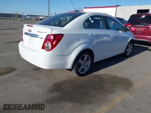 2016 Chevrolet Sonic LTZ z VIN 1G1JE5SB0G4144421, wystawiony jako IAAI lot #42020434 z przebiegiem 120 114 mil mil oraz . Historia ofert i sprzedaży dostępna na DreamBid. Obrazek 4.