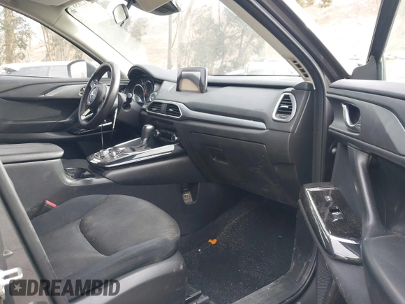 2018 Mazda CX-9 Sport with VIN JM3TCABY1J0224741, listed as a IAAI auction lot 41265876 with 126,686 mi miles and . Bid and sale history available at DreamBid. Image 5.