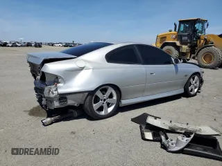 2006 Pontiac GTO z VIN 6G2VX12U16L565993, wystawiony jako Copart lot #57291015 z przebiegiem 190 257 mil mil oraz Szkoda całkowita • Salvage title. Historia ofert i sprzedaży dostępna na DreamBid. Obrazek 3.