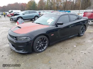 2021 Dodge Charger Scat Pack Widebody with VIN 2C3CDXGJ9MH643347, listed as a IAAI auction lot 41028032 with 76,615 mi miles. Bid and sale history available at carsss.com. Image 18.