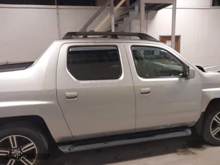 2014 Honda Ridgeline SE with VIN 5FPYK1F65EB006410, listed as a IAAI auction lot 41471886 with 92,406 mi miles. Bid and sale history available at carsss.com. Image 14.