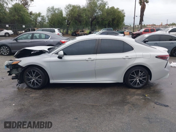 2023 Toyota Camry SE with VIN 4T1G11AK9PU143223, listed as a IAAI auction lot 41794392 with 22,806 mi miles. Bid and sale history available at carsss.com. Image 14.