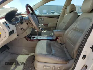 2006 Hyundai Azera SE z VIN KMHFC46F56A098008, wystawiony jako Copart lot #51842105 z przebiegiem 129 476 mil mil oraz Tytuł czysty. Historia ofert i sprzedaży dostępna na DreamBid. Obrazek 7.