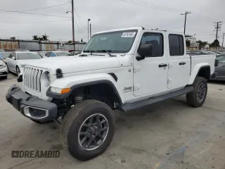 2023 Jeep Gladiator Overland z VIN 1C6HJTFG6PL516742, wystawiony jako Copart lot #65762465 z przebiegiem Nie podano mil oraz Szkoda całkowita • Salvage title. Historia ofert i sprzedaży dostępna na DreamBid. Obrazek 1.