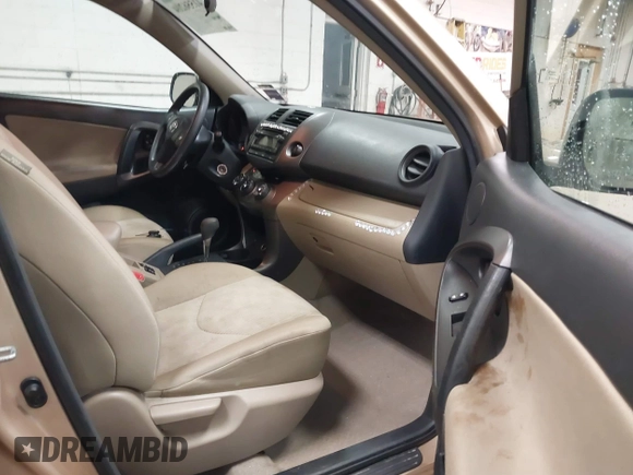 2012 Toyota RAV4 with VIN 2T3BK4DVXCW075983, listed as a IAAI auction lot 41556204 with 105,838 mi miles. Bid and sale history available at carsss.com. Image 5.