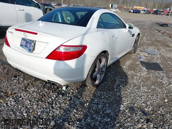2014 Mercedes-Benz SLK 250 with VIN WDDPK4HA2EF085432, listed as a IAAI auction lot 41141812 with 65,718 mi miles and . Bid and sale history available at DreamBid. Image 4.