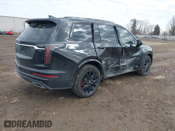 2024 Cadillac XT6 AWD Sport z VIN 1GYKPHRS8RZ750238, wystawiony jako IAAI lot #41769814 z przebiegiem 3 600 mil mil oraz . Historia ofert i sprzedaży dostępna na DreamBid. Obrazek 4.