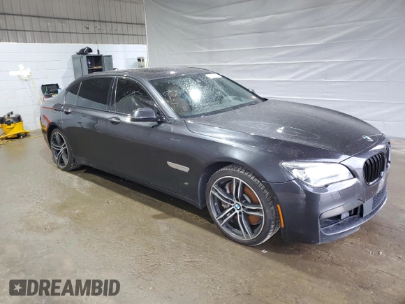 2015 BMW 7 Series 750Li xDrive z VIN WBAYF8C57FD653916, wystawiony jako Copart lot #52864275 z przebiegiem 138 811 mil mil oraz Szkoda całkowita • Salvage title. Historia ofert i sprzedaży dostępna na DreamBid. Obrazek 4.