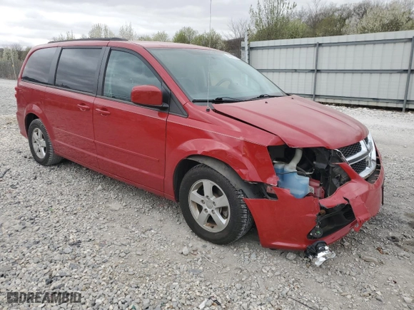 2012 Dodge Grand Caravan SXT with VIN 2C4RDGCGXCR172186, listed as a Copart auction lot 49641015 with 69,726 mi miles and Salvage Title. Bid and sale history available at carsss.com. Image 4.