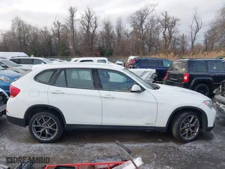 2013 BMW X1 28i with VIN WBAVM1C58DVW45962, listed as a IAAI auction lot 41323144 with 117,363 mi miles. Bid and sale history available at carsss.com. Image 13.