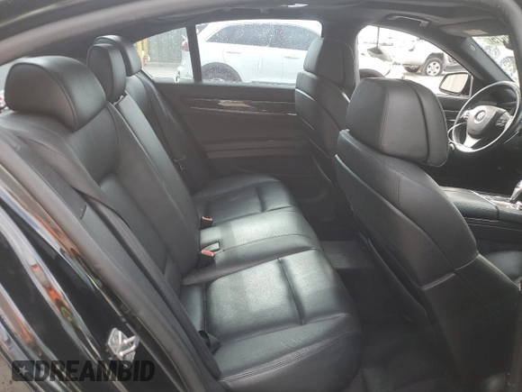 2011 BMW 7 Series 740i with VIN WBAKA4C52BC612977, listed as a Copart auction lot 52582575 with 157,813 mi miles and Salvage Title. Bid and sale history available at carsss.com. Image 10.
