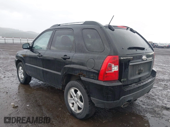 2009 Kia Sportage LX with VIN KNDJE723497612745, listed as a IAAI auction lot 41974301 with 141,110 mi miles and . Bid and sale history available at carsss.com. Image 3.