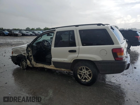 2004 Jeep Grand Cherokee Laredo z VIN 1J4GW48S74C165732, wystawiony jako Copart lot #56316885 z przebiegiem 177 139 mil mil oraz Szkoda całkowita • Salvage title. Historia ofert i sprzedaży dostępna na DreamBid. Obrazek 2.