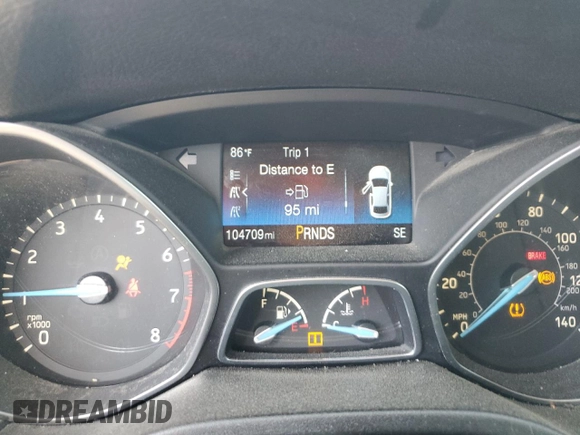 2016 Ford Focus SE with VIN 1FADP3FE8GL381855, listed as a Copart auction lot 57366645 with 104,709 mi miles and Salvage title. Bid and sale history available at DreamBid. Image 9.