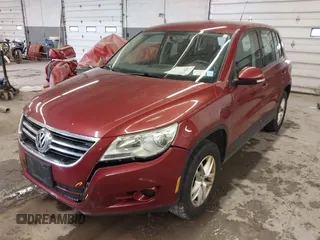 2011 Volkswagen Tiguan SE with VIN WVGBV7AX9BW000461, listed as a IAAI auction lot 42032028 with 149,896 mi miles and . Bid and sale history available at DreamBid. Image 6.
