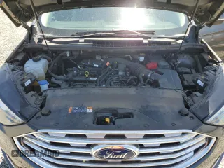 2020 Ford Edge SEL с VIN 2FMPK3J97LBA48892, выставлен на аукционе Copart как лот 58008145 с пробегом 52 588 миль миль и Списание • Salvage title. История ставок и продаж доступна на DreamBid. Изображение 12.