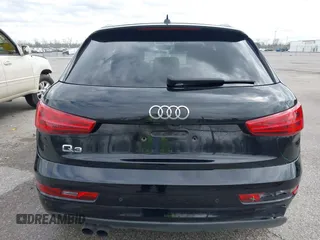 2018 Audi Q3 Premium z VIN WA1BCCFS8JR013032, wystawiony jako IAAI lot #41706173 z przebiegiem 111 402 mil mil oraz . Historia ofert i sprzedaży dostępna na DreamBid. Obrazek 16.