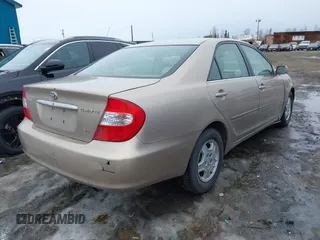 2002 Toyota Camry XLE z VIN 4T1BF32K42U533788, wystawiony jako IAAI lot #42024918 z przebiegiem 120 168 mil mil oraz . Historia ofert i sprzedaży dostępna na DreamBid. Obrazek 4.