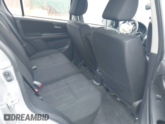 2011 Suzuki SX4 z VIN JS2YC5A41B6300385, wystawiony jako IAAI lot #41570810 z przebiegiem 117 847 mil mil oraz . Historia ofert i sprzedaży dostępna na DreamBid. Obrazek 8.