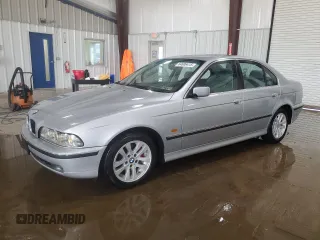 1997 BMW 5 Series 528i with VIN WBADD532XVBV50122, listed as a Copart auction lot 64606415 with 125,053 mi miles and Clean title. Bid and sale history available at DreamBid. Image 1.