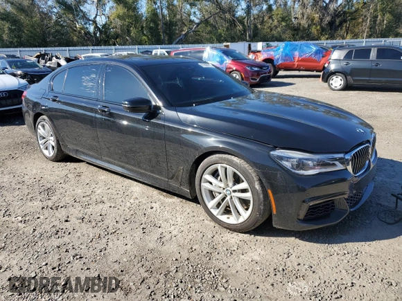 2016 BMW 7 Series 750i with VIN WBA7F0C5XGGL99549, listed as a Copart auction lot 41880015 with 54,181 mi miles and Salvage Title. Bid and sale history available at carsss.com. Image 4.