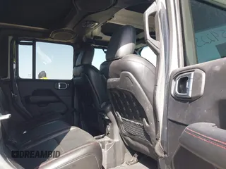 2022 Jeep Gladiator Rubicon z VIN 1C6JJTBG2NL167034, wystawiony jako IAAI lot #41854225 z przebiegiem Nie podano mil oraz . Historia ofert i sprzedaży dostępna na DreamBid. Obrazek 8.