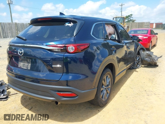 2022 Mazda CX-9 Touring z VIN JM3TCBCY7N0600370, wystawiony jako IAAI lot #42658049 z przebiegiem 113 000 mil mil oraz . Historia ofert i sprzedaży dostępna na DreamBid. Obrazek 4.