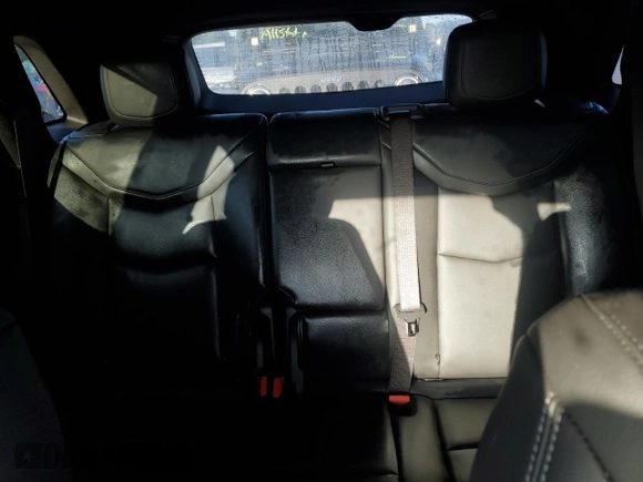 2022 Cadillac XT5 FWD Luxury z VIN 1GYKNAR49NZ159814, wystawiony jako Copart lot #74506584 z przebiegiem 7 069 mil mil oraz Nie do naprawy • Non repairable. Historia ofert i sprzedaży dostępna na DreamBid. Obrazek 10.