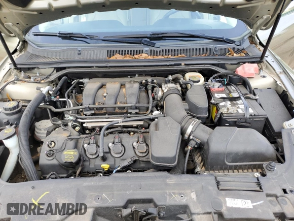 2013 Ford Taurus Limited z VIN 1FAHP2F84DG233065, wystawiony jako Copart lot #60356025 z przebiegiem 37 362 mil mil oraz Szkoda całkowita • Salvage title. Historia ofert i sprzedaży dostępna na DreamBid. Obrazek 11.