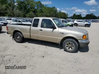 2002 Ford Ranger XLT Appearance with VIN 1FTYR44E32TA51614, listed as a Copart auction lot 61653905 with 194,762 mi miles and Salvage title. Bid and sale history available at DreamBid. Image 4.
