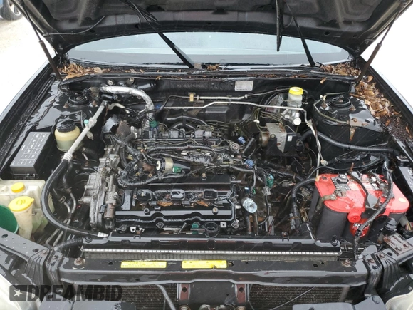 2002 Nissan Maxima GXE z VIN JN1DA31D42T427865, wystawiony jako Copart lot #74374134 z przebiegiem Nie podano mil oraz Szkoda całkowita • Salvage title. Historia ofert i sprzedaży dostępna na DreamBid. Obrazek 11.