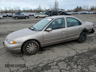 1996 Ford Contour z VIN 3FALP6535TM129390, wystawiony jako Copart lot #73338064 z przebiegiem 87 588 mil mil oraz Szkody całkowita. Historia ofert i sprzedaży dostępna na DreamBid. Obrazek 1.