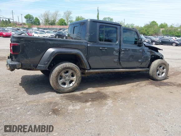 2021 Jeep Gladiator Freedom with VIN 1C6HJTAG3ML557932, listed as a IAAI auction lot 42150245 with 26,656 mi miles and . Bid and sale history available at DreamBid. Image 4.