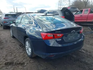 2018 Chevrolet Malibu LT z VIN 1G1ZD5ST7JF214362, wystawiony jako IAAI lot #41676417 z przebiegiem 73 908 mil mil oraz . Historia ofert i sprzedaży dostępna na DreamBid. Obrazek 3.