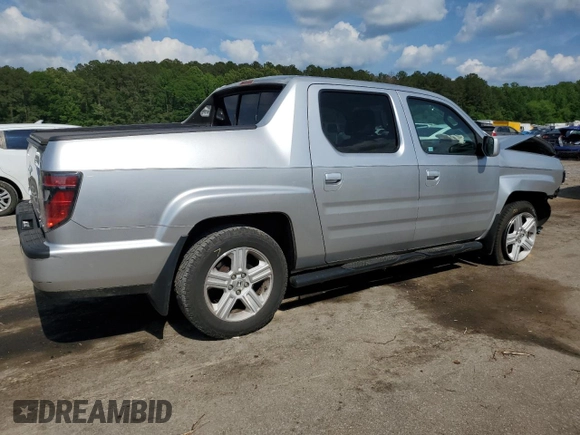 2014 Honda Ridgeline RTL with VIN 5FPYK1F57EB002835, listed as a Copart auction lot 54748905 with 111,253 mi miles and Salvage title. Bid and sale history available at DreamBid. Image 3.