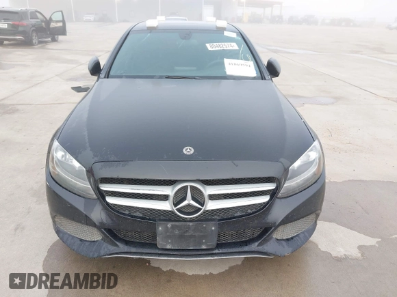 2018 Mercedes-Benz C 300 with VIN 55SWF4JB8JU234808, listed as a IAAI auction lot 41869594 with 220,883 mi miles and . Bid and sale history available at carsss.com. Image 6.