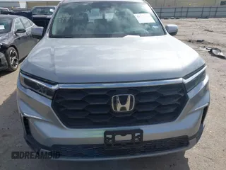 2025 Honda Pilot EX-L z VIN 5FNYG2H46SB013504, wystawiony jako IAAI lot #41777928 z przebiegiem 5 163 mil mil oraz . Historia ofert i sprzedaży dostępna na DreamBid. Obrazek 13.