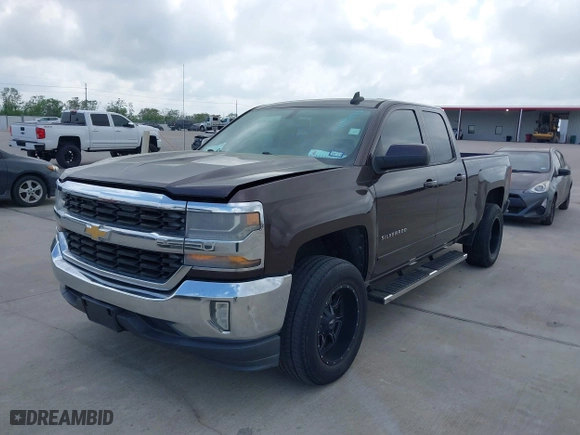 2016 Chevrolet Silverado 1500 LT with VIN 1GCRCREC8GZ180162, listed as a IAAI auction lot 41946432 with 162,090 mi miles. Bid and sale history available at carsss.com. Image 2.