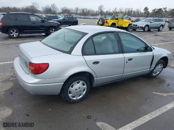 2002 Saturn SL with VIN 1G8ZH52872Z262235, listed as a IAAI auction lot 41424144 with 164,498 mi miles. Bid and sale history available at carsss.com. Image 4.
