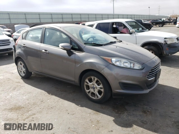 2014 Ford Fiesta SE with VIN 3FADP4EJ0EM195954, listed as a Copart auction lot 51356835 with 75,136 mi miles and Salvage Title. Bid and sale history available at DreamBid. Image 4.