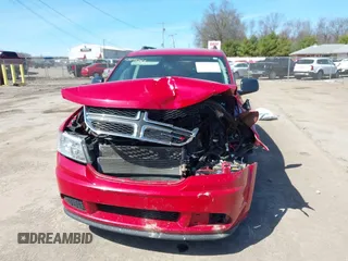 2016 Dodge Journey SE with VIN 3C4PDCAB2GT165839, listed as a IAAI auction lot 42045161 with 147,007 mi miles and . Bid and sale history available at DreamBid. Image 12.