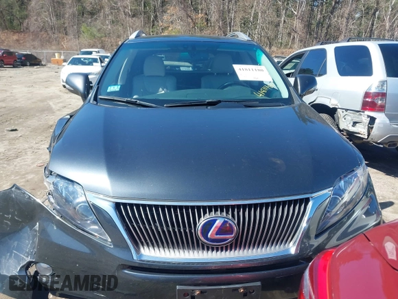 2011 Lexus RX 450h with VIN JTJBC1BA9B2423630, listed as a IAAI auction lot 41811180 with 90,121 mi miles and . Bid and sale history available at DreamBid. Image 13.