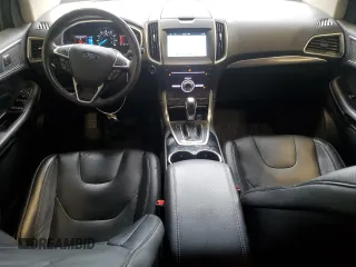 2017 Ford Edge Titanium z VIN 2FMPK4K81HBB72398, wystawiony jako Copart lot #55325635 z przebiegiem 112 917 mil mil oraz Nie do naprawy • Non repairable. Historia ofert i sprzedaży dostępna na DreamBid. Obrazek 8.