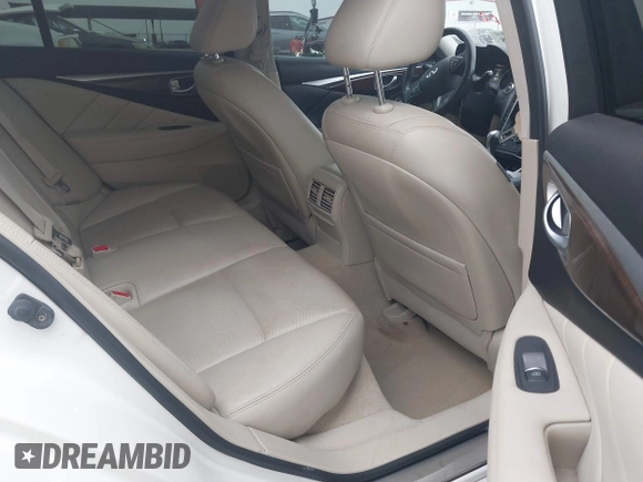 2015 Infiniti Q50 Premium z VIN JN1BV7AP9FM331131, wystawiony jako IAAI lot #41786108 z przebiegiem 176 874 mil mil oraz . Historia ofert i sprzedaży dostępna na DreamBid. Obrazek 8.