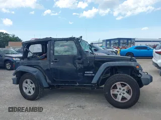 2015 Jeep Wrangler Freedom Edition with VIN 1C4AJWAG4FL681688, listed as a IAAI auction lot 42488018 with Not provided miles and . Bid and sale history available at DreamBid. Image 13.