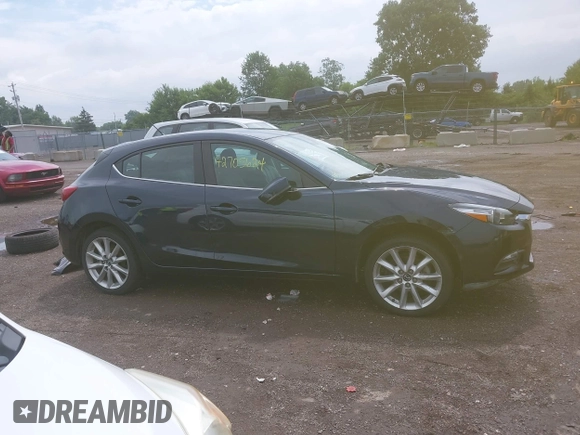 2017 Mazda 3 Touring with VIN 3MZBN1L79HM122581, listed as a IAAI auction lot 42705624 with 52,175 mi miles and . Bid and sale history available at DreamBid. Image 14.